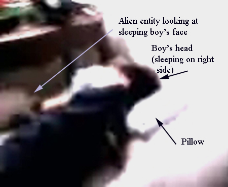 Alien next to bed of sleeping boy