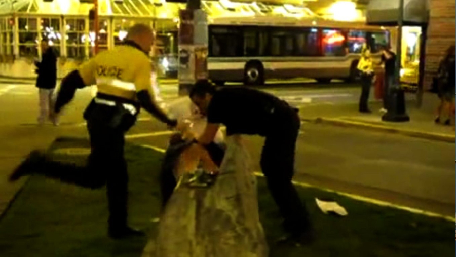 Vitoria Police BRutalize Seated Prostrate Arrestee 